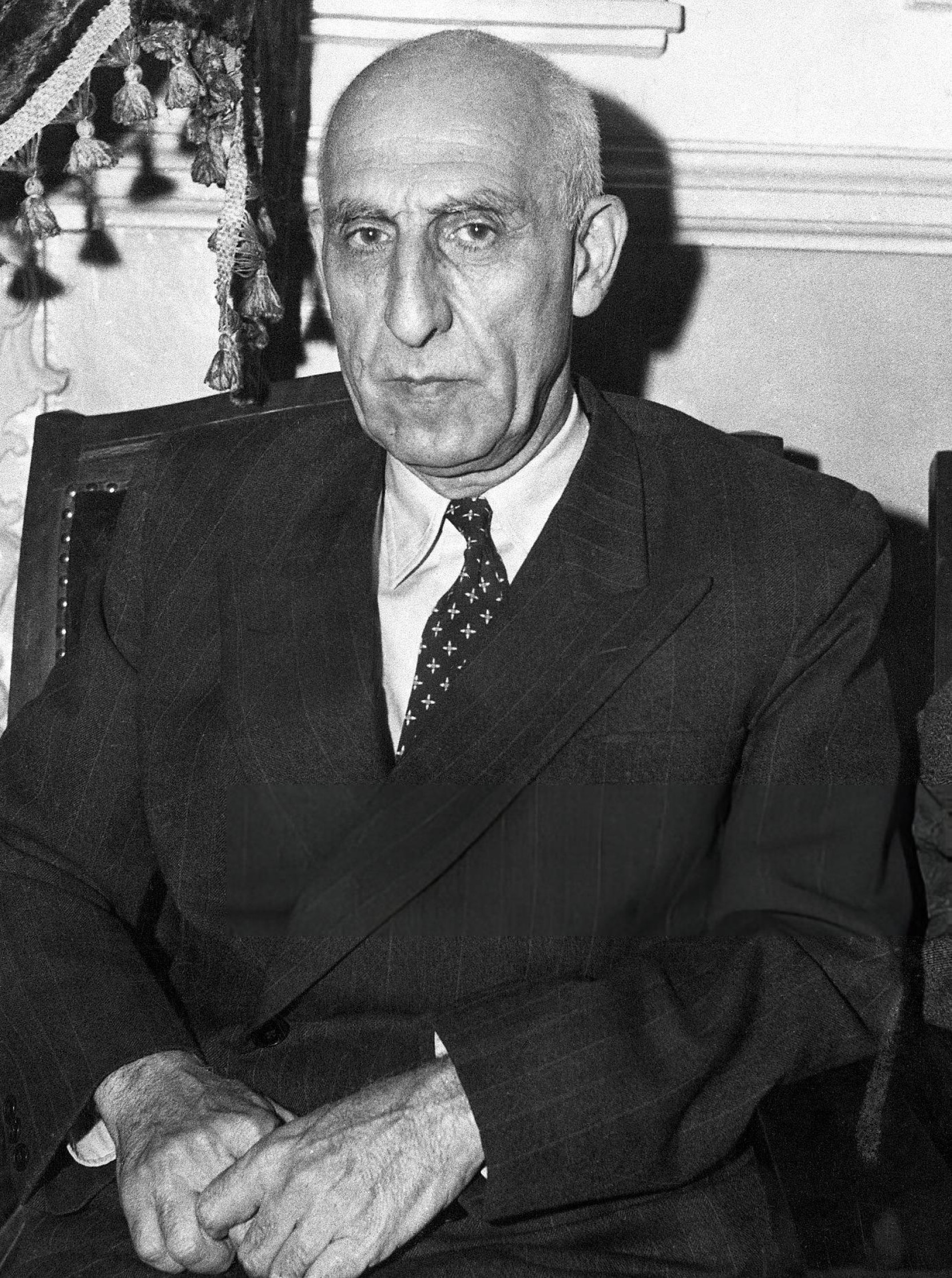 Iranian Prime Minister Mohammad Mosaddegh seated for a portrait in 1951